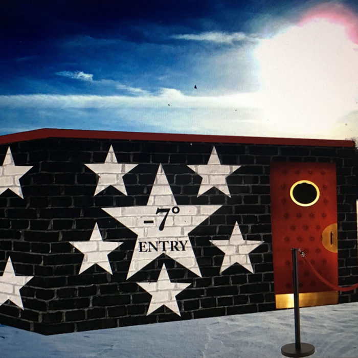 a shanty with black walls, white stars, and a red door mimics the First Avenue's 7th Street Entry, with a stanchion out on the snowy ground.