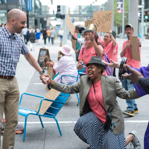 Photo of people performing on the street
