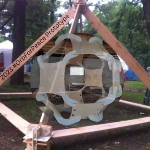 A rendering of an orb handing inside of a pyramid structure. Words read "2023 #orbforpeace prototype"