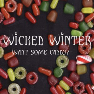 A black background with colorful candy and the words "wicked winter - want some candy?'