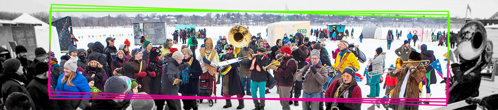 A man plays a tuba among a large crowd of people