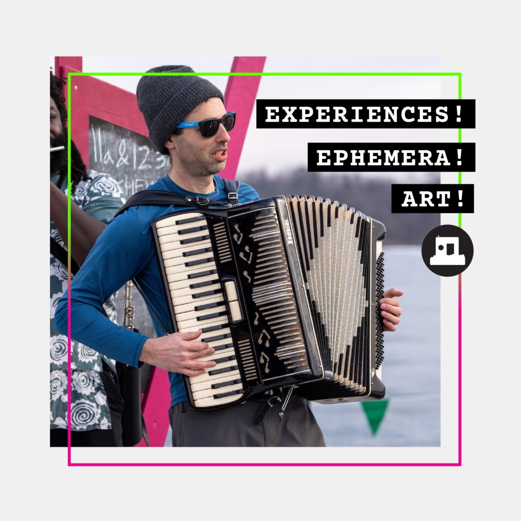 a person plays the accordian outside at the shanty performance stage. Overlaid text reads 'experiences! ephemera! art!'