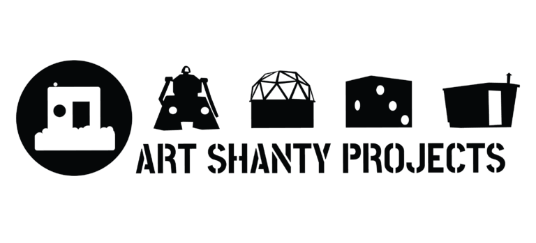 a row of shanties, including the iconic logo, with stenciled font reading ART SHANTY PROJECTS